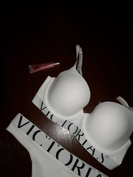 Жіночі трусики Танга Victoria's Secret 621484158 білі 621484158 фото