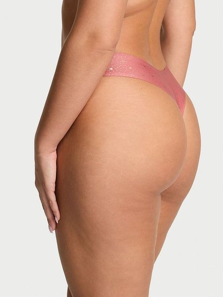 Жіночі трусики Танга Victoria's Secret 19552408 рожеві 19552408 фото